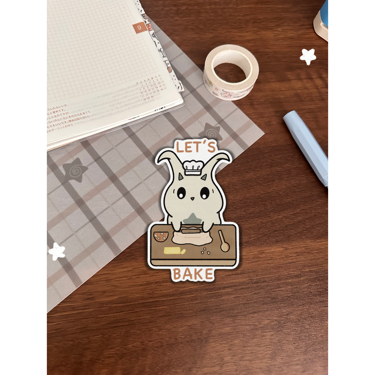 Lün rolling dough sticker on a wooden table with journal 