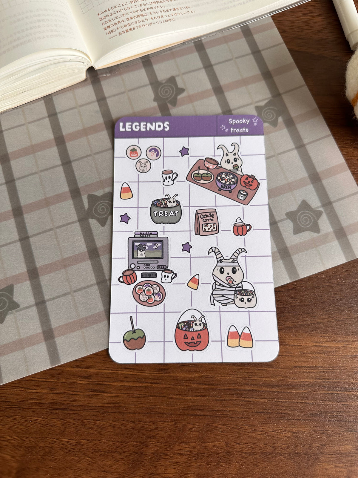 Halloween treats sticker sheet on top of wooden desk 