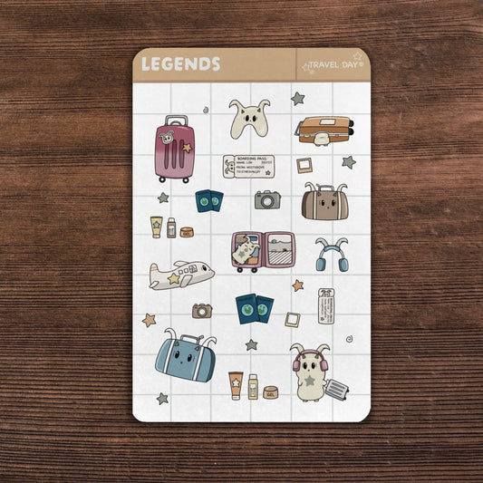 Travel day sticker sheet laying on wooden desk 